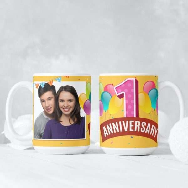 Two white mugs with colourful balloons and a personalised photo upload design featuring a bright pink 1st Anniversary text