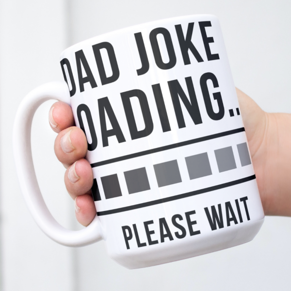 White mug with bold black text reading Dad Joke Loading… Please Wait